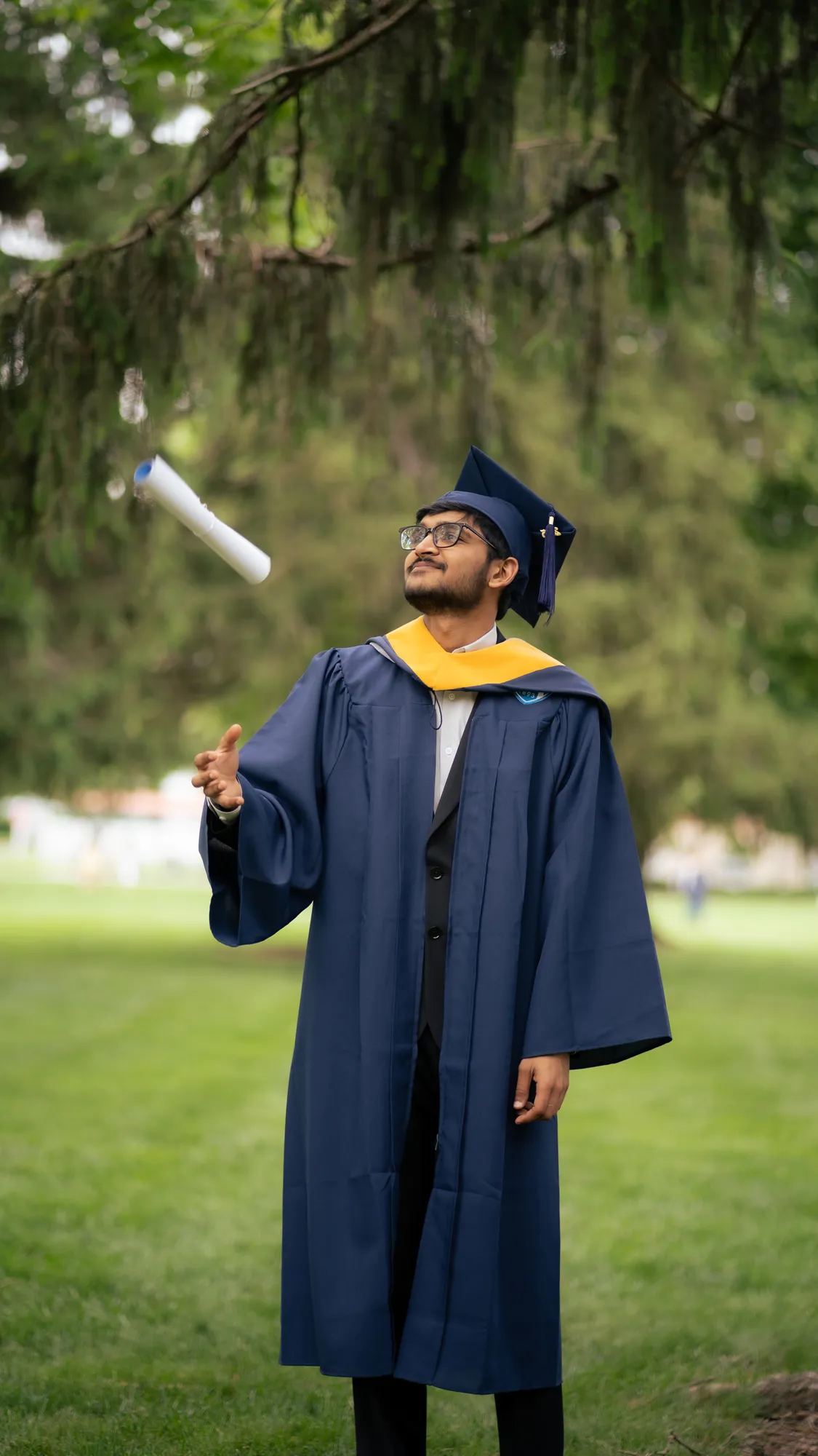2025 Graduation portrait by Ashish Shrestha